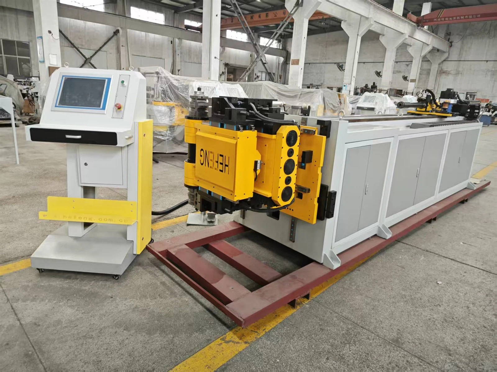 Повністю автоматична машина для згинання труб із обертовою головкою